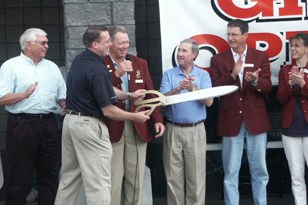 grand opening with giant scissors